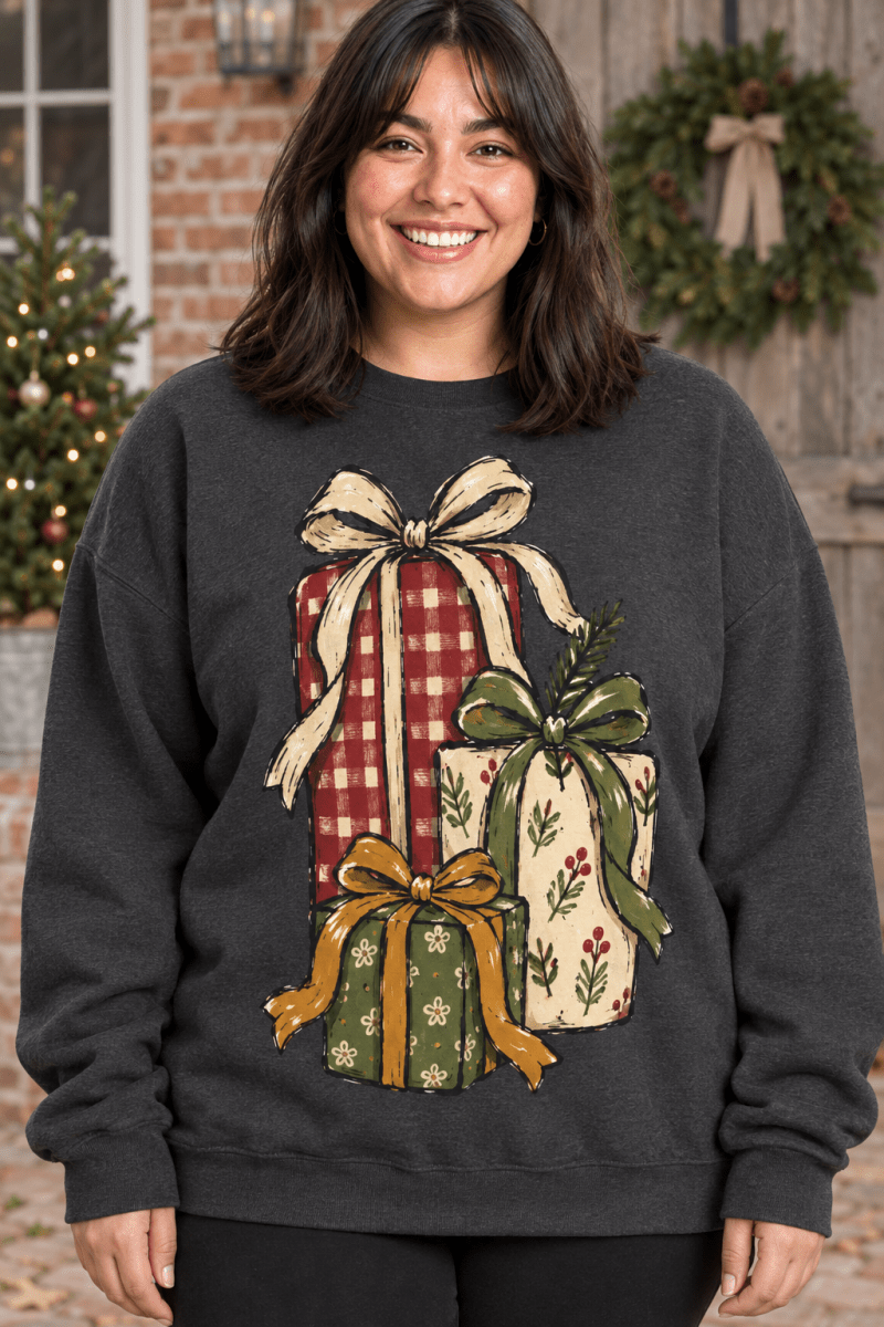 The Doodled Flower Boutique charcoal grey crewneck sweatshirt featuring a hand-drawn Christmas gift stack print.