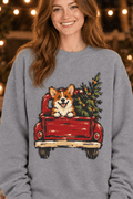 The Doodled Flower Boutique grey crewneck sweatshirt featuring a corgi in a red vintage truck with a Christmas tree.