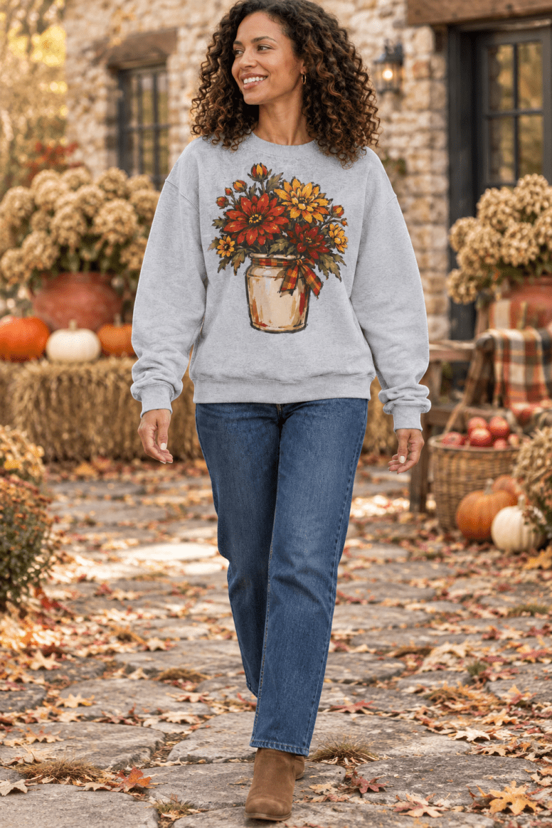 The Doodled Flower Boutique grey crewneck sweatshirt featuring a hand-drawn fall mum floral graphic in a crock.